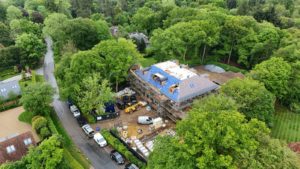 Aerial view of the Woodrising luxury residential development in its wooded setting