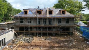 Drone view of the Woodrising front elevation with dormer windows